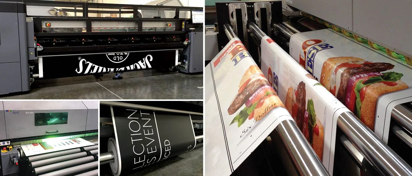 Impresoras de gran formato produciendo banners